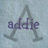 embroidered name on hot pink baby blanket