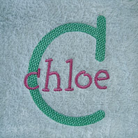 embroidered name on baby blanket with pink trim